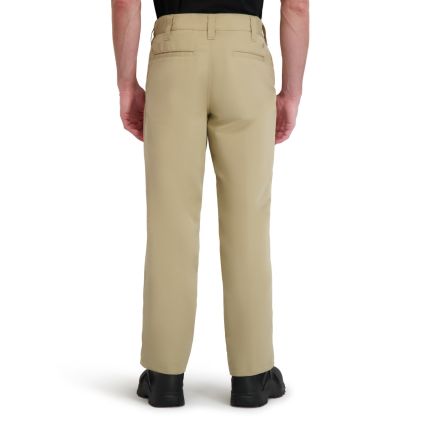 Beige pants worn by a person on a white background
