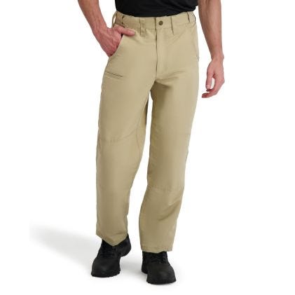 Person wearing beige pants on a white background