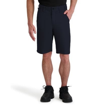 Person wearing navy shorts on a white background