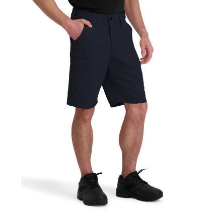 Person wearing navy shorts on a white background