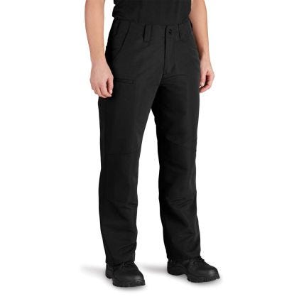 Person wearing black tactical pants on a white background