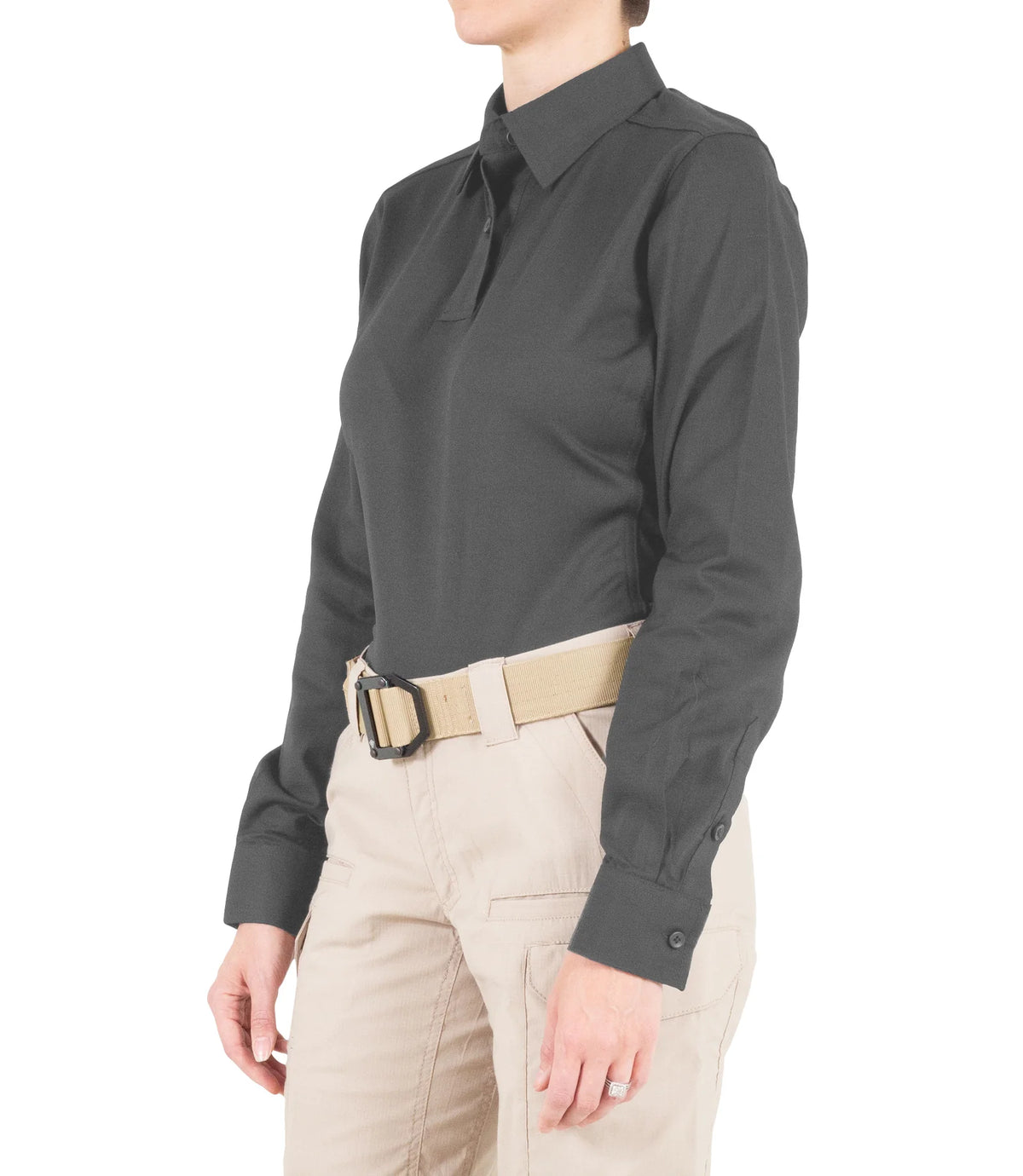 Person wearing a dark gray shirt and beige pants on a white background