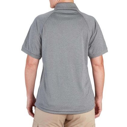 Person wearing a gray polo shirt with a white background