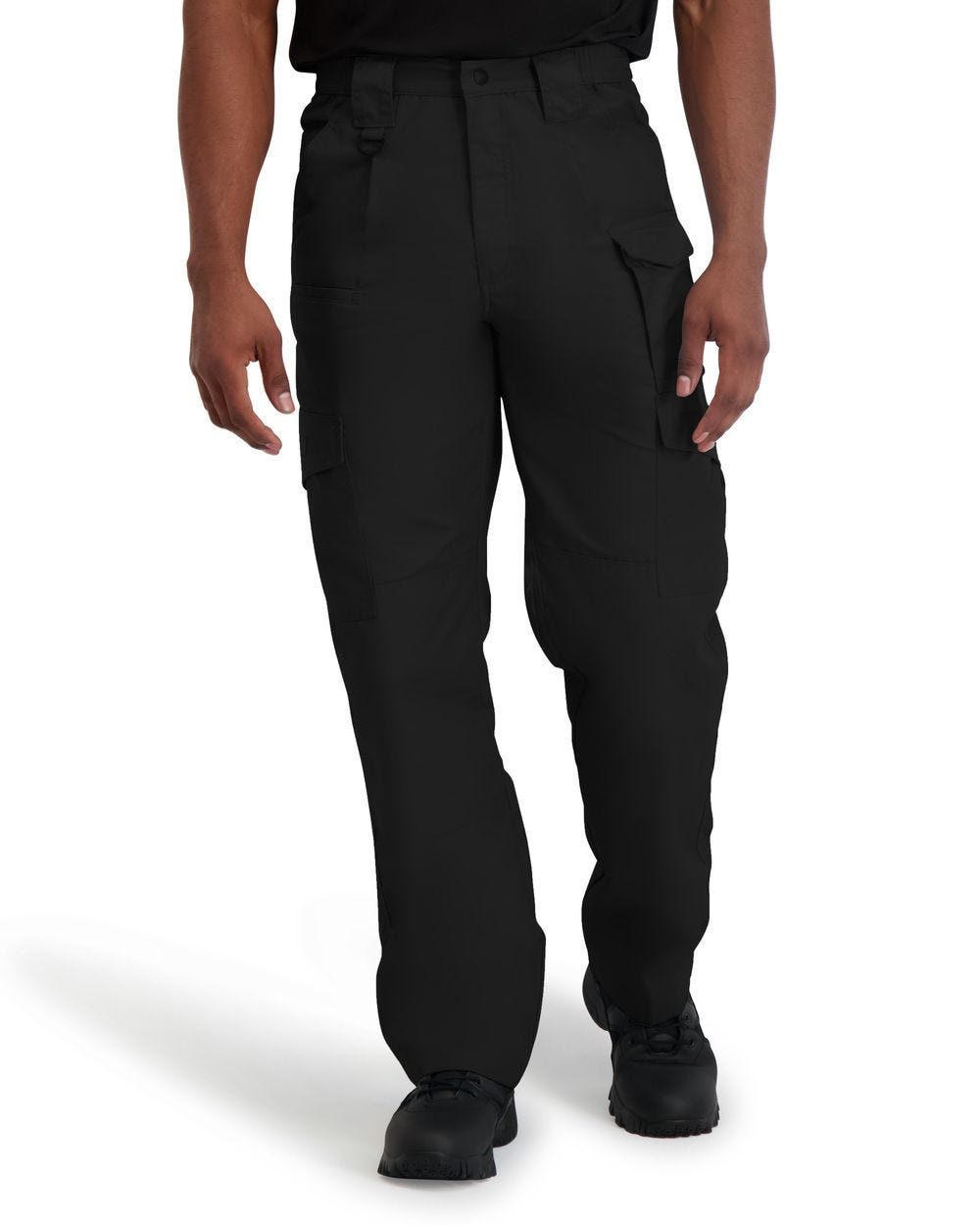 Black tactical pants worn by a person on a white background