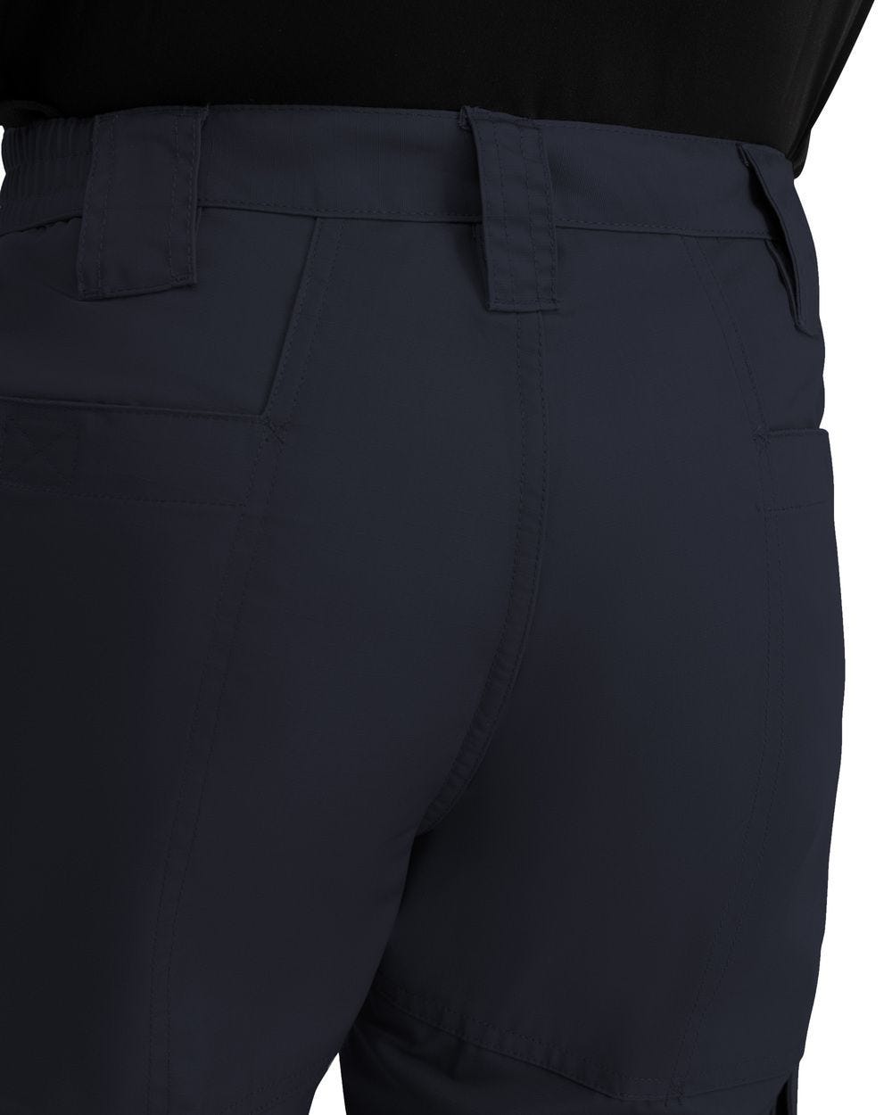 Close-up of dark blue pants with a white background