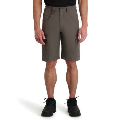 Person wearing brown shorts on a white background