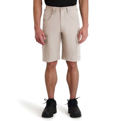 Beige shorts worn by a person on a white background