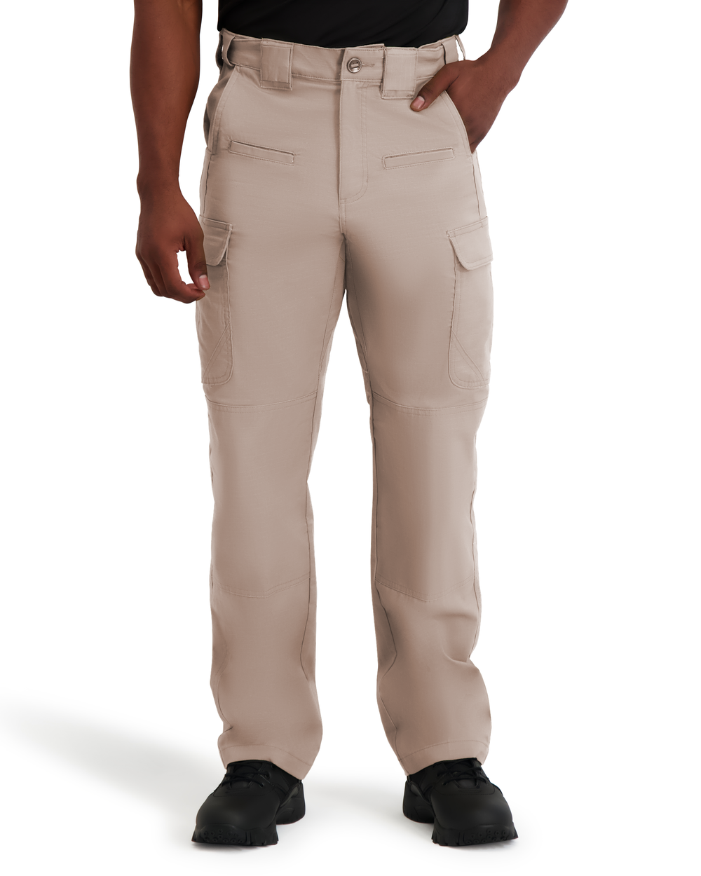 Beige pants worn by a person on a white background