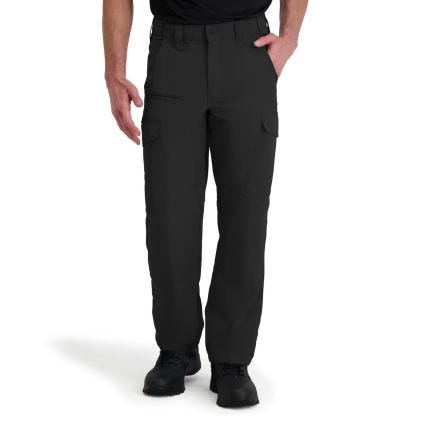 Person wearing black tactical pants on a white background