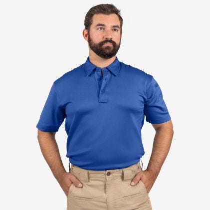 Man wearing a blue polo shirt against a white background