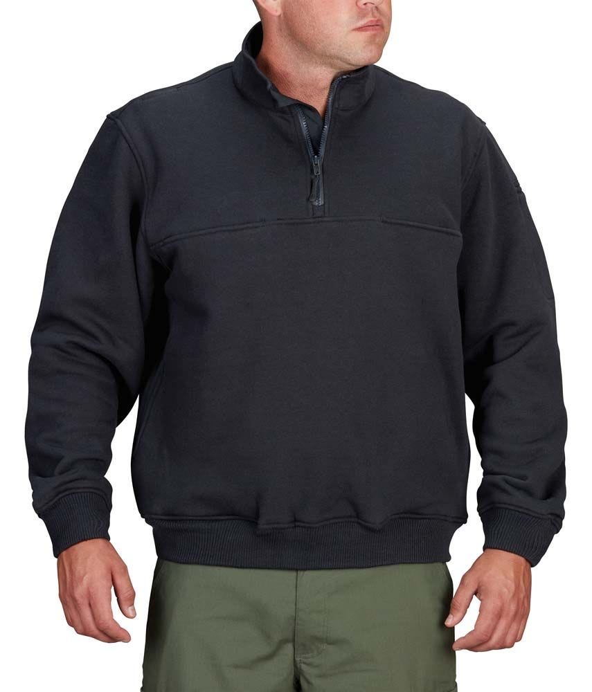 Man wearing a black pullover with a quarter zip on a white background