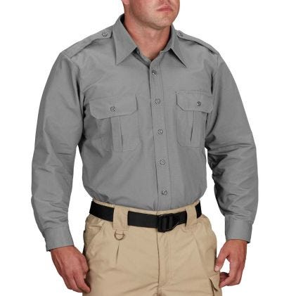 Gray shirt and beige pants worn by a person on a white background