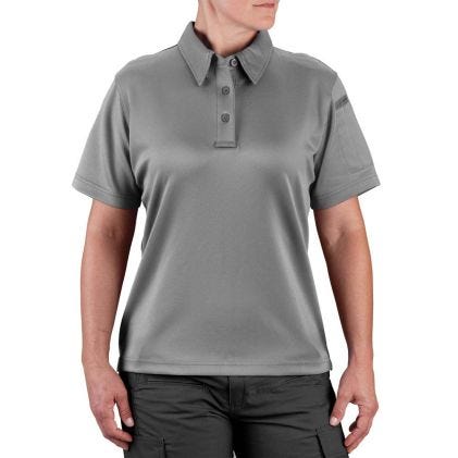 Person wearing a gray polo shirt on a white background