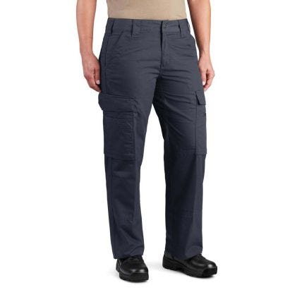 Person wearing dark blue tactical pants on a white background