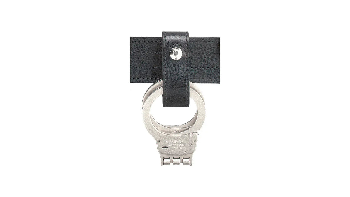Handcuff snaped to belt