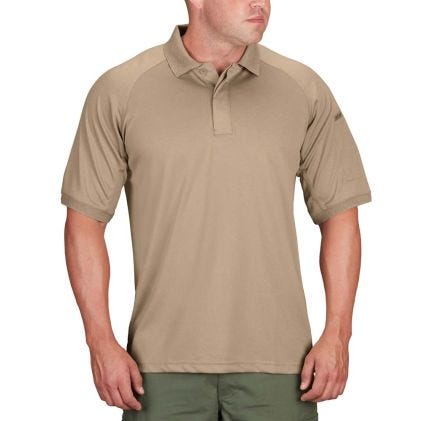 Man wearing a tan short-sleeve polo shirt on a white background